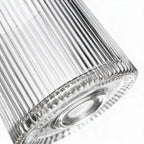 Coda clear whisky glass with a rotating base and ribbed texture