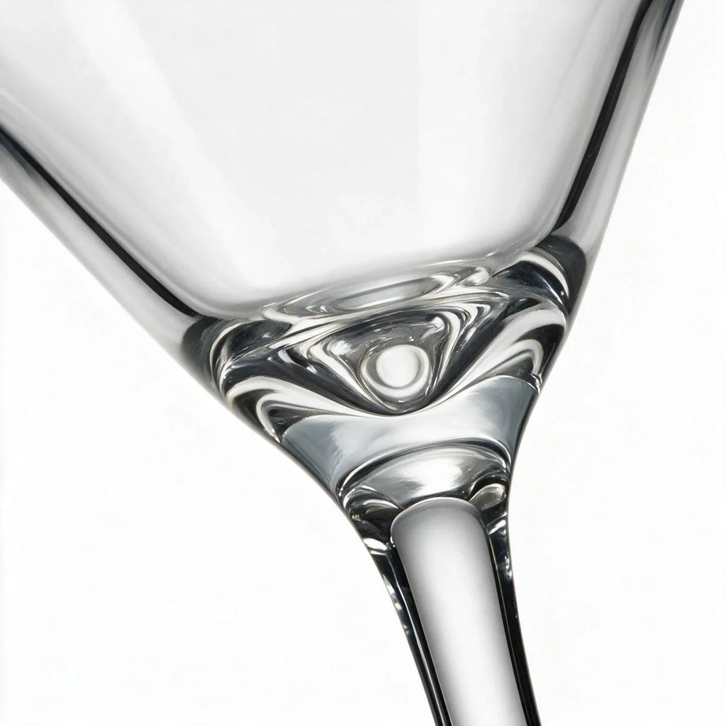 Vesper clear cocktail glass with star cut facets and a classic martini bowl 