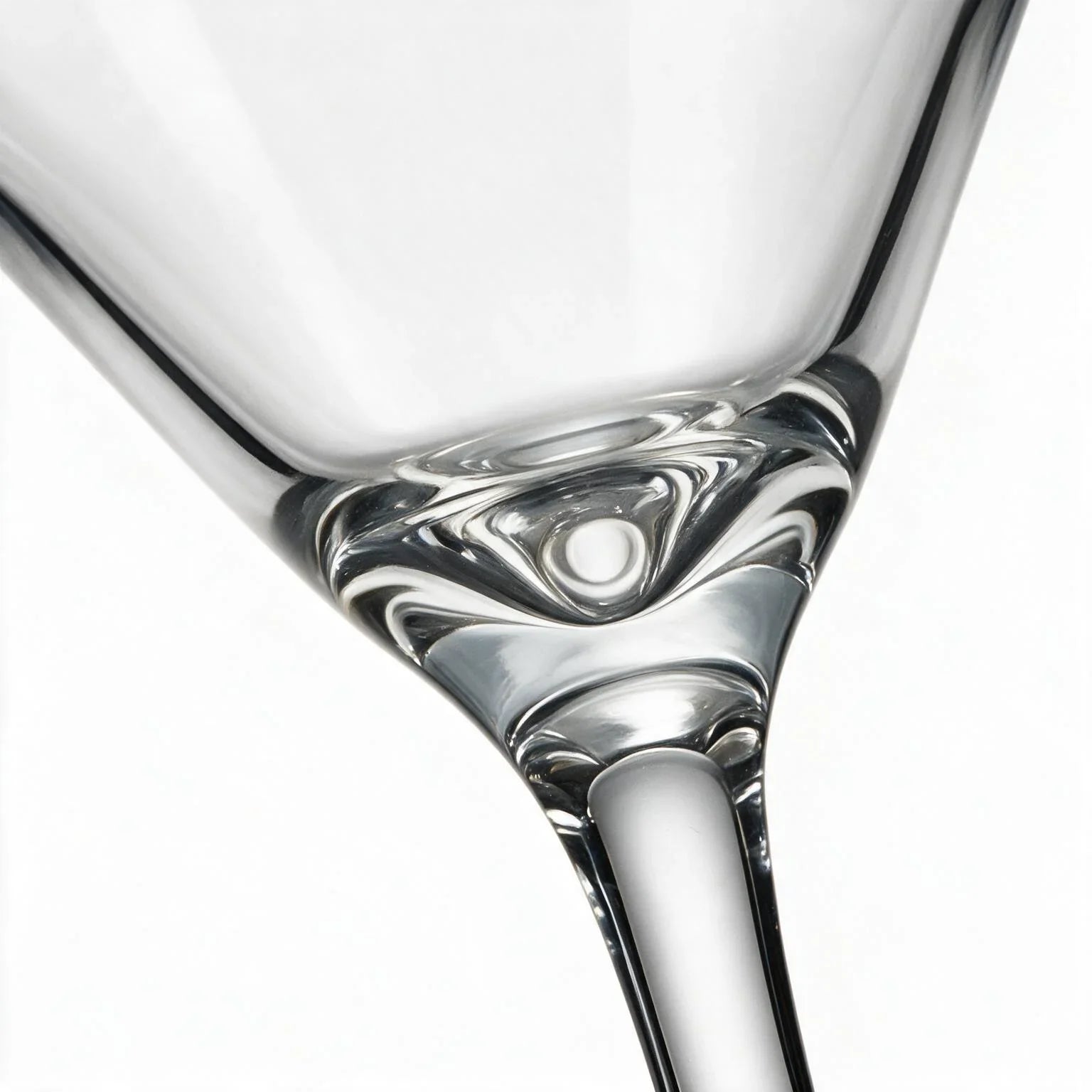 Vesper clear cocktail glass with star cut facets and a classic martini bowl 