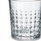 Valen clear glass ice bucket with diamond cut facets and a metal handle