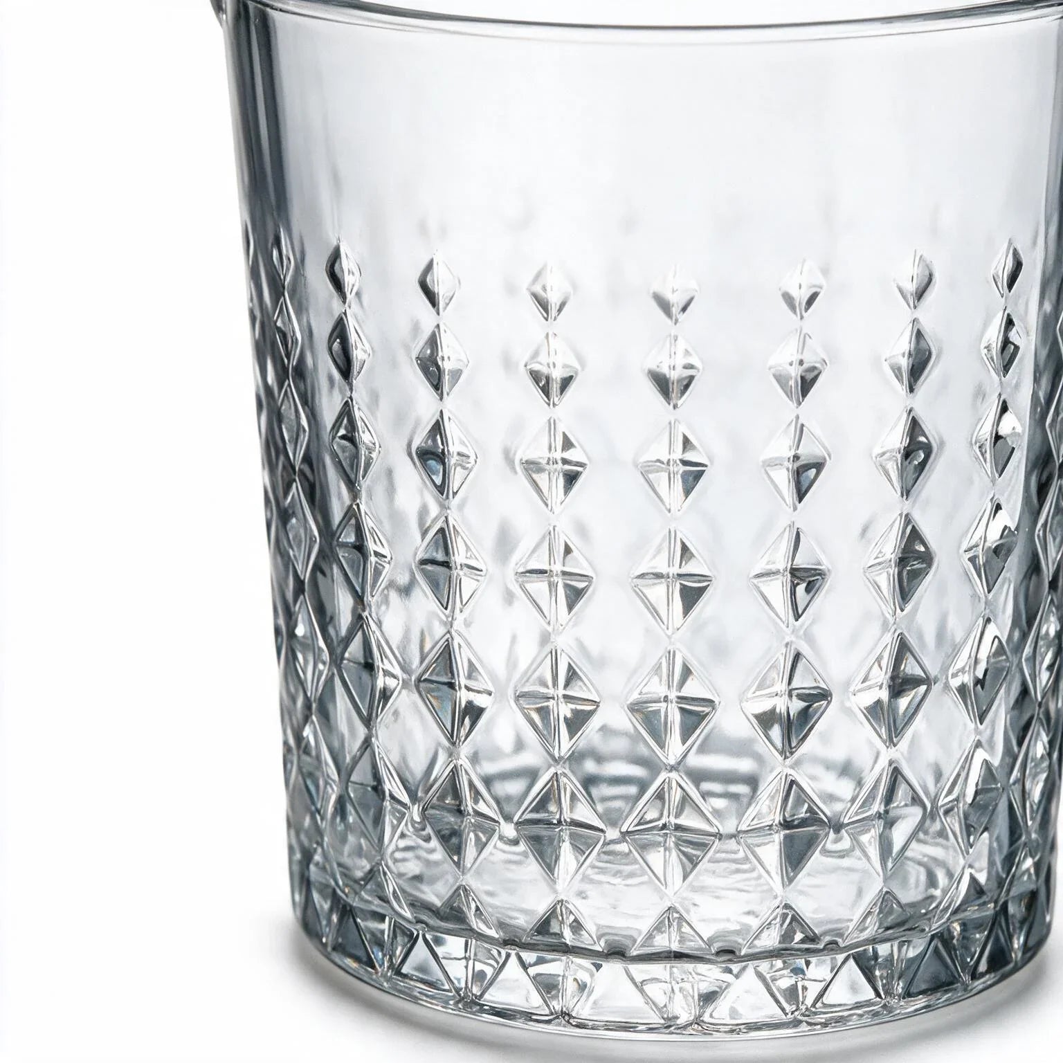 Valen clear glass ice bucket with diamond cut facets and a metal handle