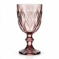 Amara dusky rose cocktail glass with diamond cut facets and a short stem