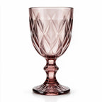 Amara dusky rose cocktail glass with diamond cut facets and a short stem
