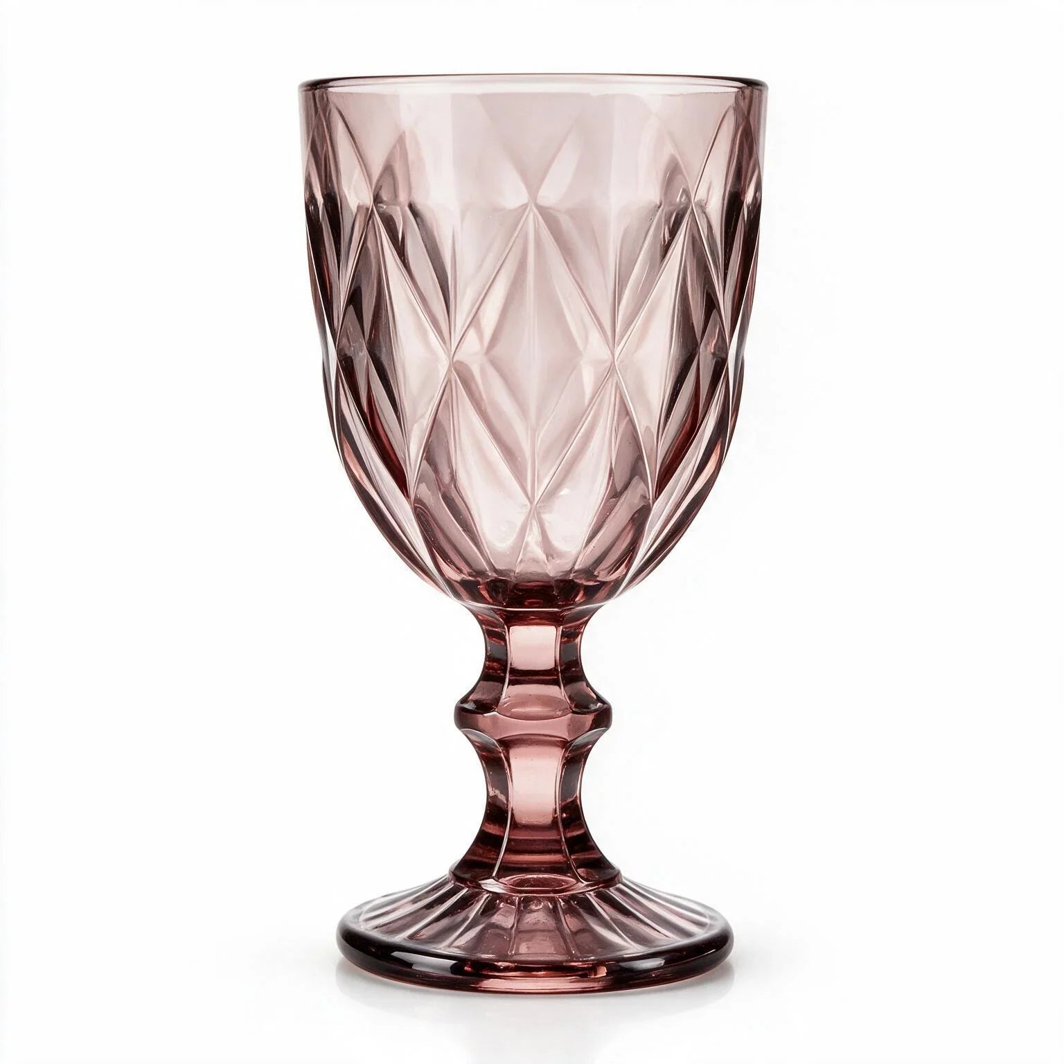 Amara dusky rose cocktail glass with diamond cut facets and a short stem